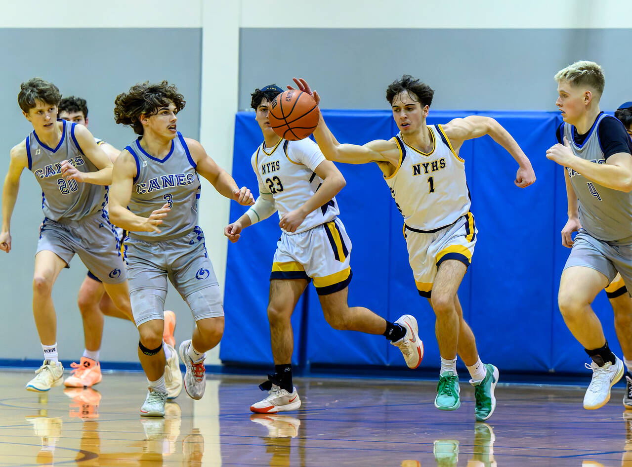 Evan Kaufthal gets control of the ball for NYHS vs. Mount Vernon Christian on Jan. 25, 2025. Photos courtesy of Patrick Krohn