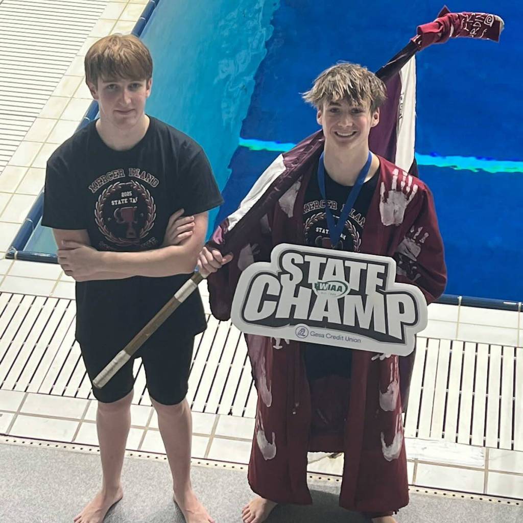 Mercer Island High School freshman Connor Carson, right, won the boys 3A one-meter diving state championship on Feb. 20 at the King County Aquatic Center in Federal Way. MI junior Shane Kornblum, left, took 10th in the competition. Photo courtesy of the Mercer Island School District