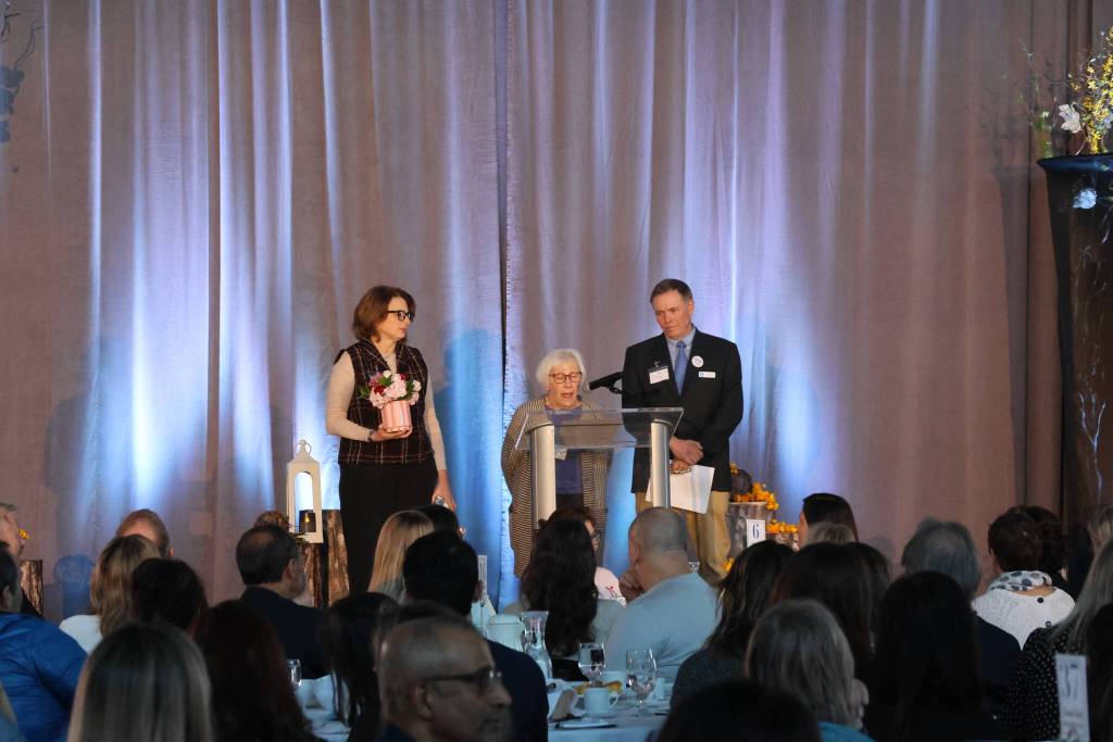Mercer Island Youth and Family Services (MIYFS) Administrator Derek Franklin and MIYFS Foundation Executive Director Amy French with Carin Mack, who received the 2025 Philanthropy Award. Photo courtesy of Steve Sogge