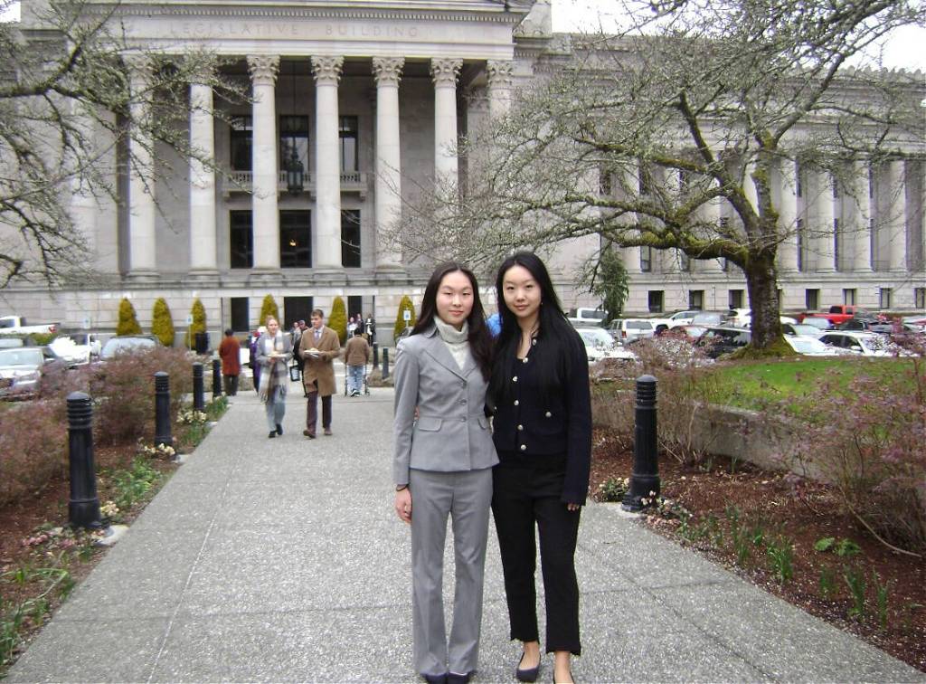 Mercer Islands Grace Go, right, stands with her friend Scarlett Luo, a junior at Edmonds Woodway High School, in Olympia on Feb. 18. Both are members of Make Us Visible Washington. Courtesy photo