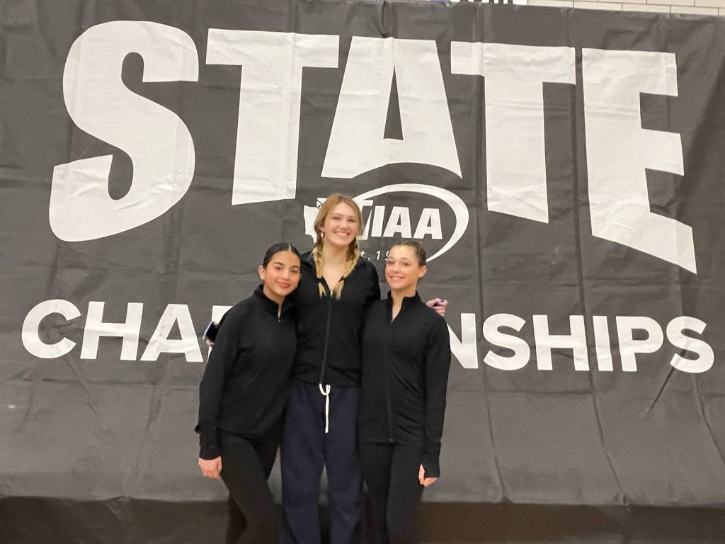 Mercer Island High School gymnasts, from left to right, Manuela Mendoza Cajiao, Maya Moncaster and Rainey Rosenwald, competed at the 3A state championships on Feb. 20-21 at Sammamish High School in Bellevue. Sophomore Rosenwald competed in the all-around (33.45, 29th) with individual scores on the vault (8.025, 63rd), bars (8.15, tied for 21st), beam (8.125, tied for 36th) and floor (9.15, tied for 28th); freshman Mendoza Cajiao competed on the vault (7.5, 83rd); and junior Moncaster  a second-year state qualifier  competed on the vault (7.75, tied for 75th), bars (7.425, 49th) and beam (6.6, tied for 87th). Courtesy photo