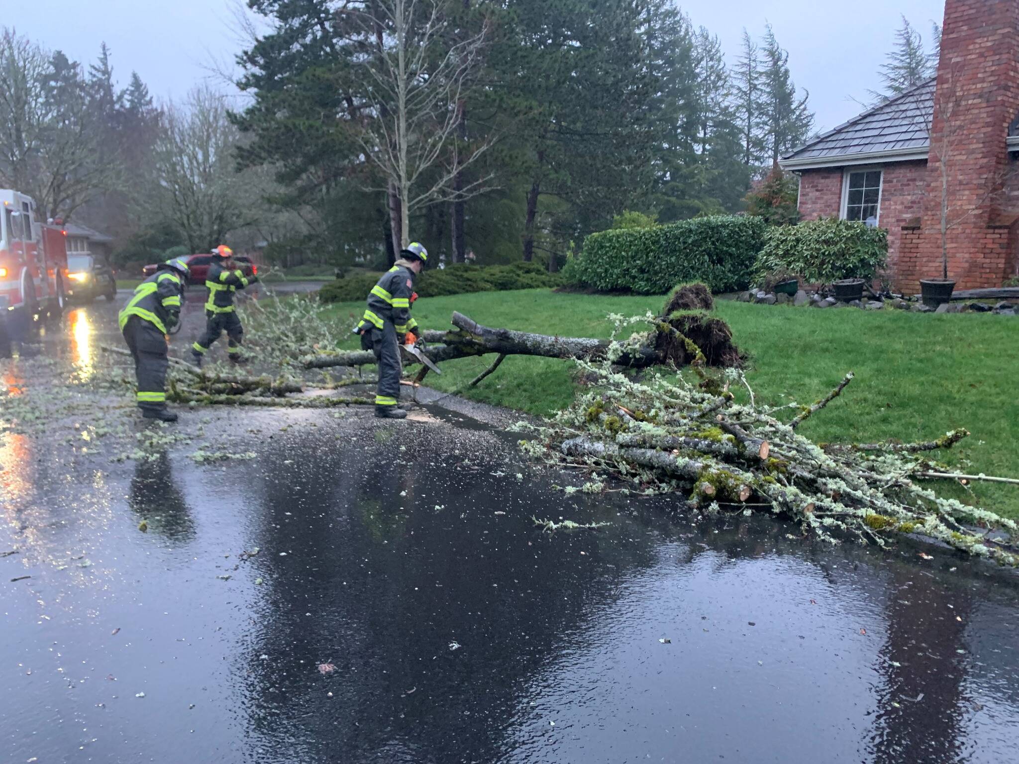 Firefighters clean up after the Feb. 24 storm. Photo courtesy of the city of Mercer Island