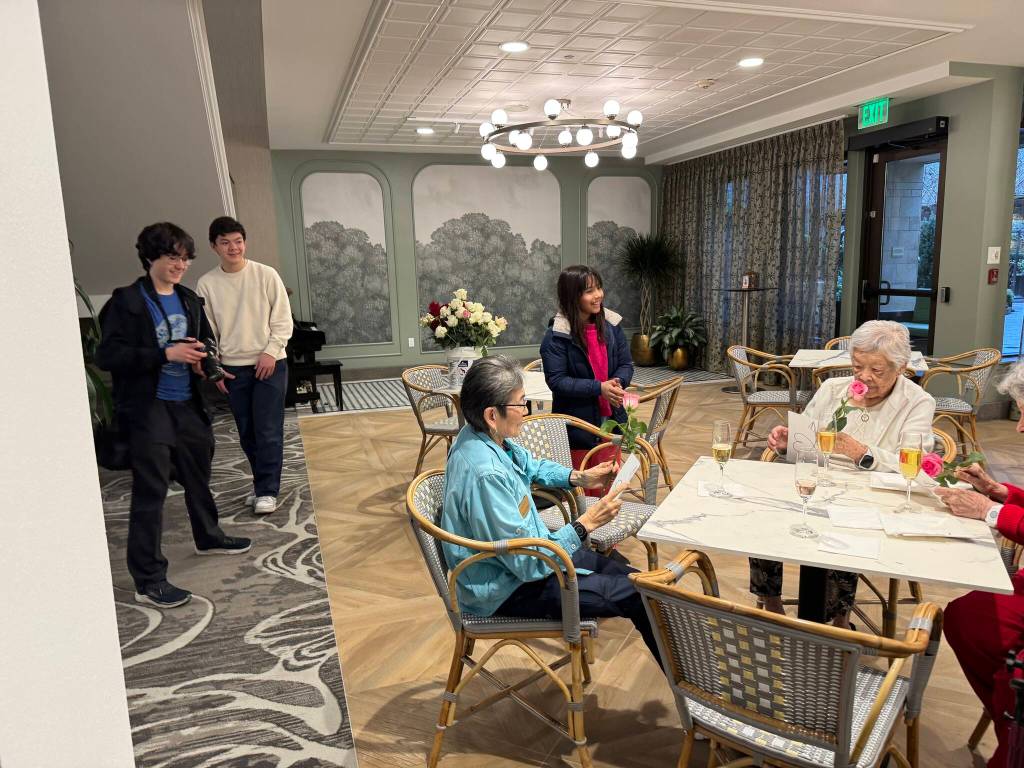 Seniors enjoy receiving their flowers. Courtesy photos