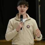Mercer Island High School senior Connor Auld speaks following a school district bond information meeting for elementary families on Feb. 27 in the Island Park Elementary School gym. Andy Nystrom staff photo