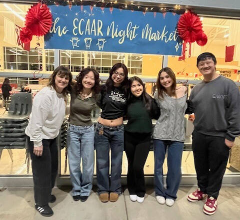 Mercer Island High Schools Education Coalition for Asian American Representation (ECAAR) Clubs leadership team is (left to right) Dani King (English teacher and club adviser), Lily Lin (senior), Angel Nguyen (sophomore), Cece Wang (senior and co-president), Anna Koskinen (senior), Christian Ha (senior and co-president) and James Young (junior  not pictured). They are pictured at the clubs Night Market on March 2. Photo courtesy of the Mercer Island School District