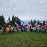 About 150 people attended a demonstration on Mercer Island on March 9 to call for the release of hostages still held by Hamas terrorists in Gaza. They gathered at Lid Park and then marched across the Interstate 90 bridge and back. Mercer Island Mayor Salim Nice spoke along with several others, including Solly Kane of the Jewish Federation of Seattle. Photos courtesy of John Hamer