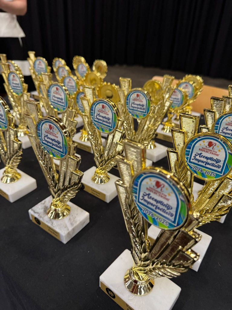 Trophies for the Reflections Program winners. Photo courtesy of Julie Hsieh