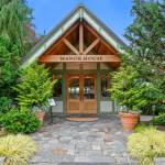 The historic Manor House is a 1920s Tudor-style venue with stunning sunset views overlooking Puget Sound. Photo courtesy of Pleasant Beach Village.