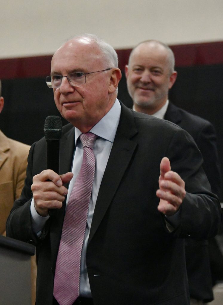 Robert Bone, chairman and founder of the New Years Day London Parade, speaks about the event at Mercer Island High School on April 2. Andy Nystrom/ staff photo