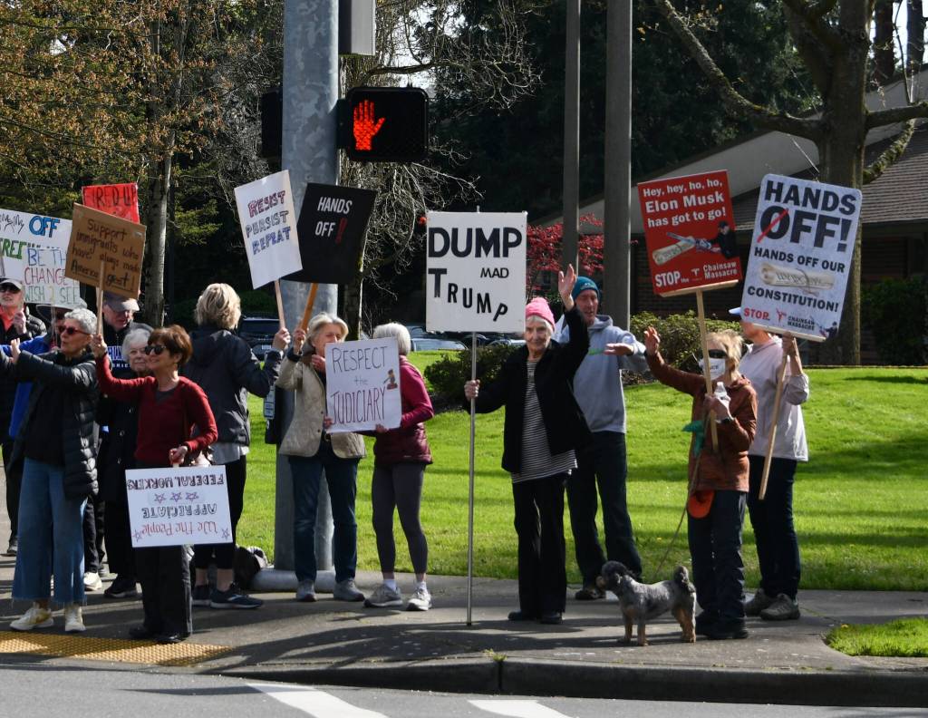 Protesters gather on Mercer Island. Andy Nystrom/ staff photo