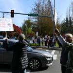 A driver honks in favor of the protesters. Andy Nystrom/ staff photo