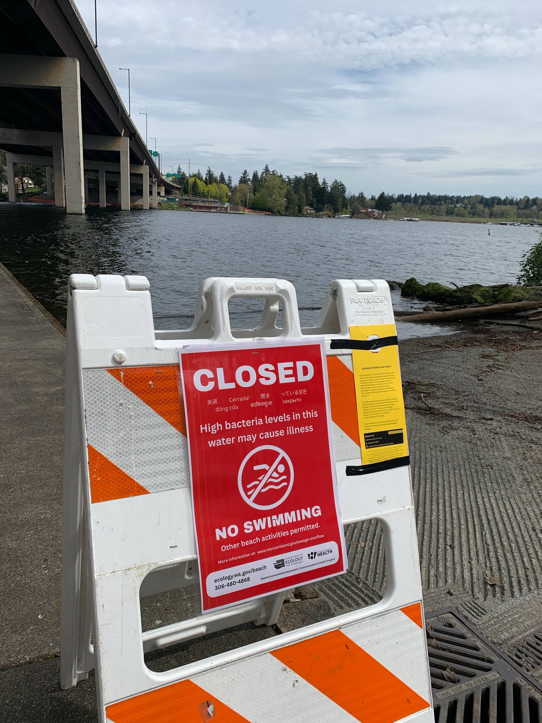 One of the signs the city posted at Mercer Island beaches and public beach access areas regarding Lake Washington water possibly being contaminated with sewage. Photo courtesy of the city of Mercer Island