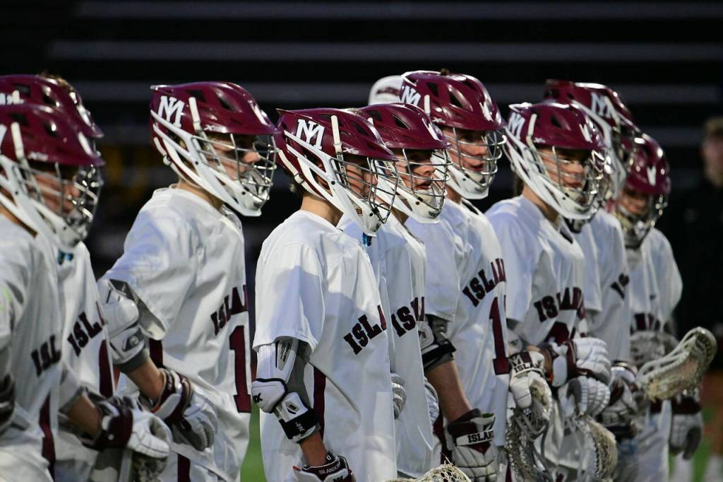 Mercer Island High School boys lacrosse players prepare to invade the field. Photo courtesy of Jim Jantos