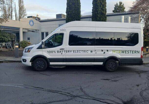 An electric shuttle bus is parked at the Mercer Island City Hall/Public Works campus. Photo courtesy of Swoop