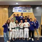 Tegan Yuasa, bottom row center, gathers with his University of Washington judo team at the national collegiate championships. Courtesy photo