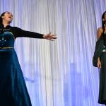 Islander Middle Schools Frozen Jr. cast members, from left to right, Ava Carlson (Elsa) and Shynah Sandhu (Anna) perform at the Mercer Island Schools Foundations Breakfast of Champions fundraiser on April 29 at Mercer Island High School. Also performing were Edi Wang (Butler) and Cordelia Reese (Housekeeper). Andy Nystrom/ staff photo