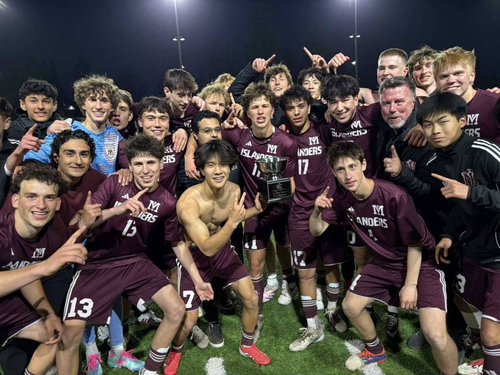Mercer Island High Schools boys soccer team celebrates its 3A KingCo tournament championship victory on May 13. Courtesy photo