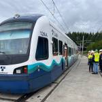 A test train is pushed across the Interstate 90 floating bridge from Mercer Island to Seattle on May 21. Photo courtesy of Sound Transit