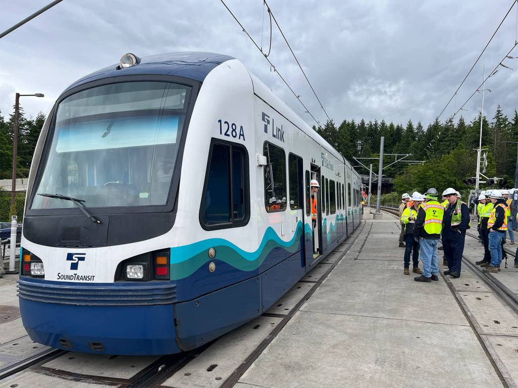 A test train is pushed across the Interstate 90 floating bridge from Mercer Island to Seattle on May 21. Photo courtesy of Sound Transit