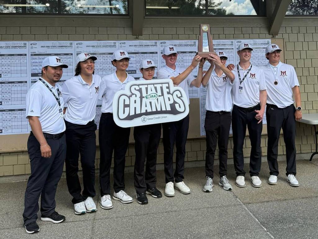 Mercer Island High Schools 3A state champion boys golf team. Pictured are head coach Nick Baker, assistant coach Ben Halter and golfers Alex Harwood, Jack Besecker, Lucas Kornylo, Yijoon Seo, Ryan Jacobson and alternate Preston Yee. Photo courtesy of the Mercer Island School District