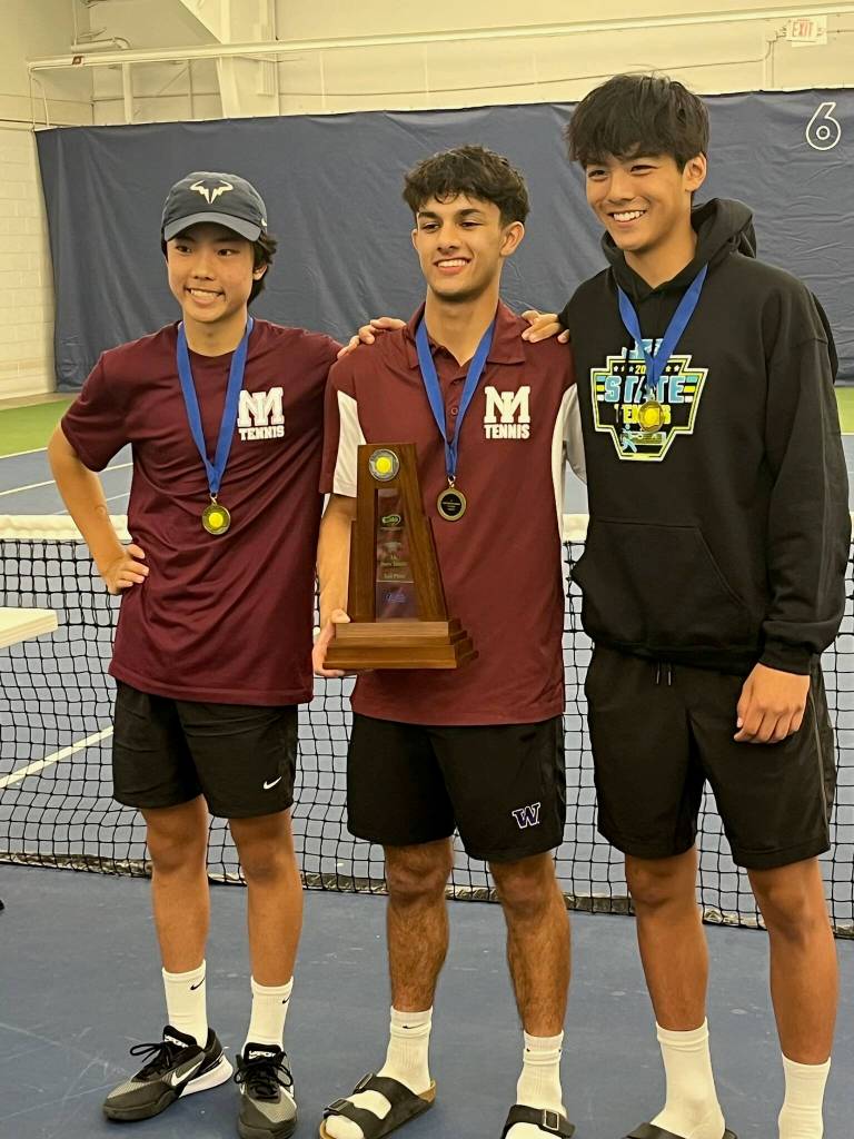 Mercer Island High Schools Joe DeGracia placed first in singles and Gian Manhas/Nolan Bang took first in doubles at the 3A state tennis tournament on May 23-24 at the Vancouver Tennis Center. The boys took second in the team standings, finishing just one point back. From left to right, DeGracia, Manhas and Bang. Courtesy photo