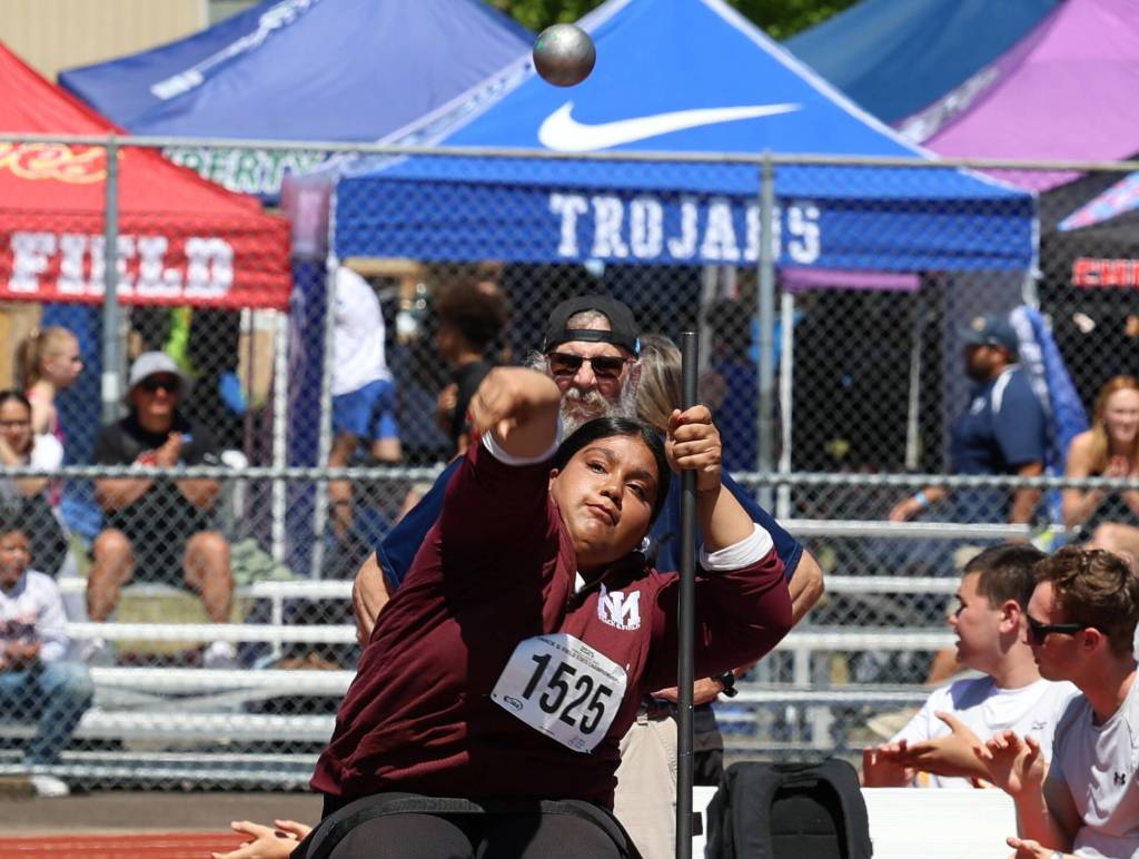 Mercer Island High Schools Sarina Sawhney unleashes the shot put in the girls wheelchair competition at the state meet. She placed first in the event. Photo courtesy of Scott Knoblich