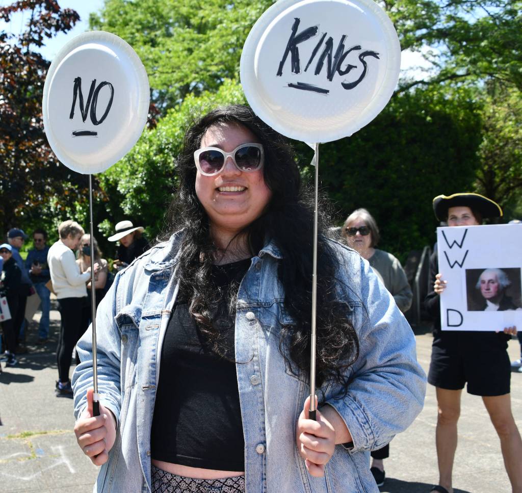 Rebecca Harless attends the No Kings rally on Mercer Island. Andy Nystrom/ staff photo