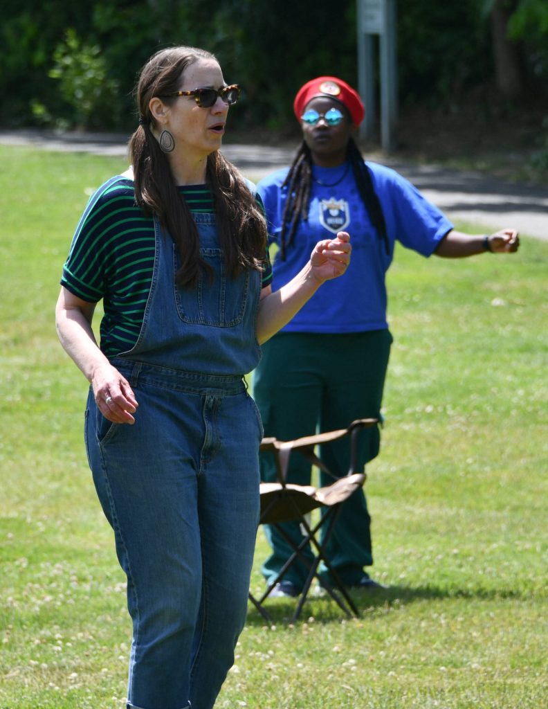 Attendees get dancing to the uplifting sounds of Simon Javan Okelo and his One Vibe Band. Andy Nystrom/ staff photo