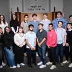 Northwest Yeshiva High Schools Class of 2025 graduation ceremony took place on June 5 at Sephardic Bikur Holim Congregation in Seward Park. Eighteen of the 19 graduates are pictured. They are: Front row left to right: Elianna Rothstein, Leah Gonzalez, Ariana Balkany, Eli Khaimov, Rubin Owen, Sol Levy, Didi Desmond, Izzy Hoffman and Emmanuel Spinoza; back row left to right: Celia Rosenbaum, Paulina Gamel, Evelyn Edwards, Isaac Almo, Ben Weichbrodt, Joe Benoliel, Noam Rosenfeld, Zach Saltsman and Jacob Klinghoffer. Not pictured: Amiel Robicsek. Photo courtesy of Mason Kelley