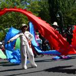 Members of the Mercer Island Chinese Association bring a colorful touch to the Mercer Island Summer Celebration downtown parade on July 12. The all-day event also featured live entertainment, art and food vendors, fireworks, interactive booths, games, opportunities to meet city departments and explore equipment and more. Activities took place at Mercerdale Park and Luther Burbank Park with a fireworks show blasting off at Luther Burbank Park at 10 p.m. Andy Nystrom/ staff photo
