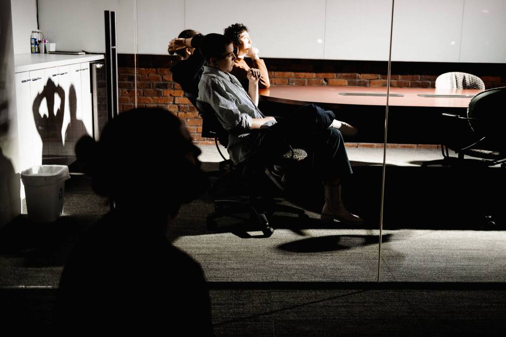 Trey McGee, foreground, watches The Double. Photo courtesy of Sarina Solem