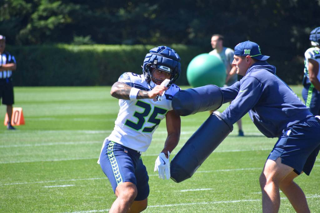 Alphonzo Tuputala, an alum of Federal Way High School and University of Washington, works on a drill during his first day at Seahawks training camp. Ben Ray / Sound Publishing