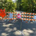 Due to construction and structural damage to the roadway during the water main break, East Mercer Way between Southeast 76th Street and the north end of Clarke Beach Park will remain closed to all vehicle, bicycle and pedestrian traffic for up to four additional weeks, with the possibility of one lane opening to traffic sooner. Photo courtesy of the city of Mercer Island
