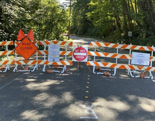 Due to construction and structural damage to the roadway during the water main break, East Mercer Way between Southeast 76th Street and the north end of Clarke Beach Park will remain closed to all vehicle, bicycle and pedestrian traffic for up to four additional weeks, with the possibility of one lane opening to traffic sooner. Photo courtesy of the city of Mercer Island
