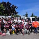 Mercer Island High Schools football players banded together in a school field cleanup day on Aug. 1. Also lending a hand were coaches, parents, Mercer Island School District facilities director Tony Kuhn and Plantscapes members. Courtesy photo