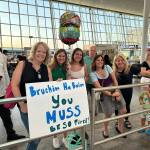 Students reunited with their parents at JFK International Airport. Photo courtesy of JD Krebs