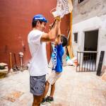 A Mercer Island Lacrosse Club player interacts with a child during a trip to Medellín, Colombia, in August. Photo courtesy of Dylan Ryan