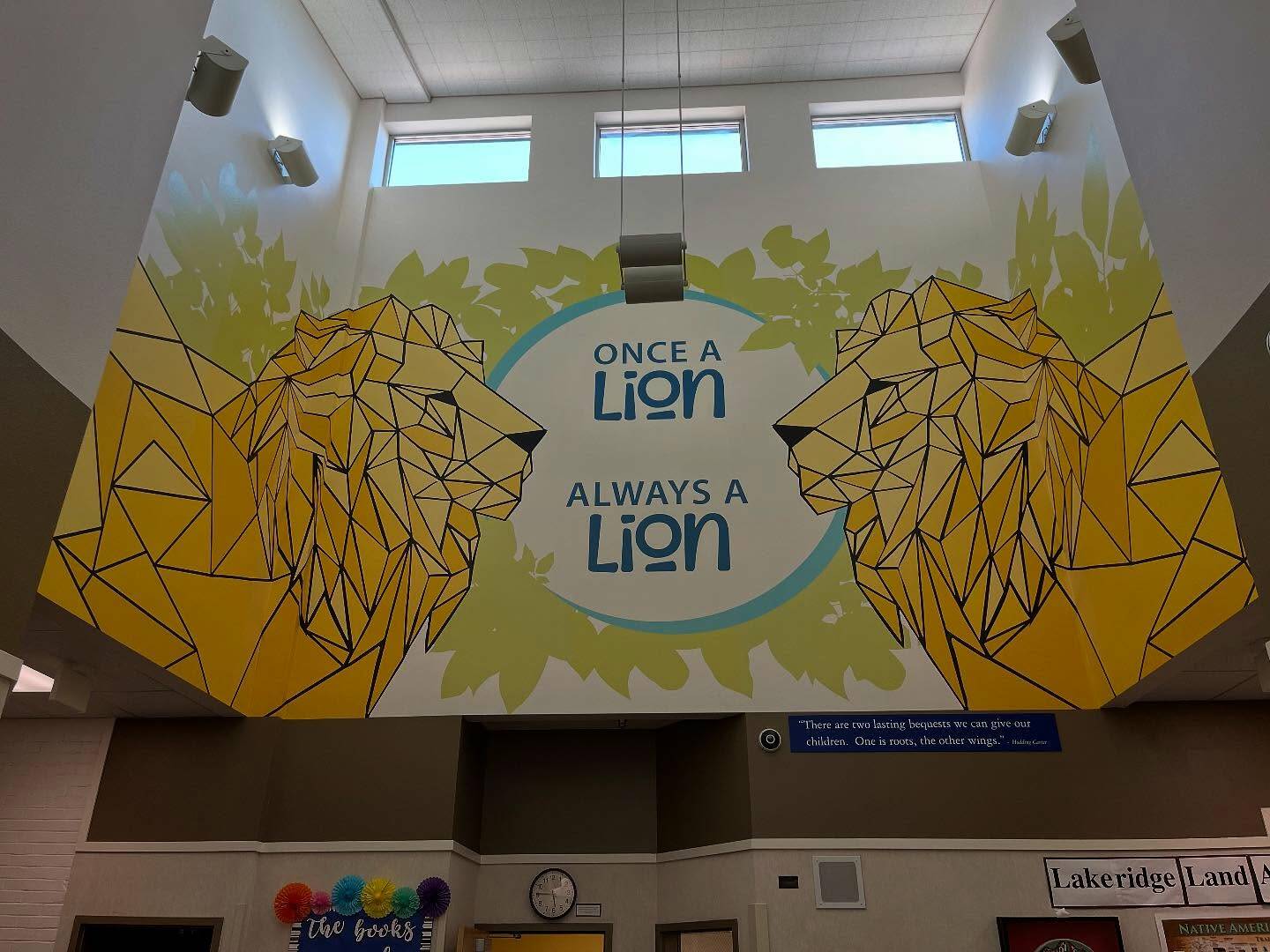 The Mercer Island School Districts facilities and operations team has put up a new lions mural at Lakeridge Elementary School. This is the first of several painted murals that will be installed between the districts three older elementary schools. These mural updates at the three schools would not be possible without the communitys support of the capital and technology levy. Photo courtesy of the Mercer Island School District