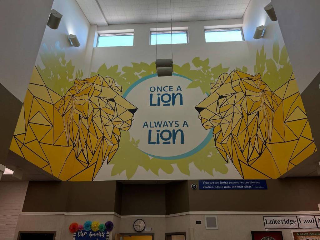 The Mercer Island School Districts facilities and operations team has put up a new lions mural at Lakeridge Elementary School. This is the first of several painted murals that will be installed between the districts three older elementary schools. These mural updates at the three schools would not be possible without the communitys support of the capital and technology levy. Photo courtesy of the Mercer Island School District