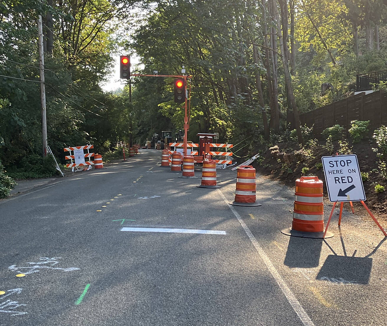 Less than three weeks since a water main break occurred and caused significant damage to a section of East Mercer Way, crews have made excellent progress on the repair front, according to the city of Mercer Island. In a social media post on Aug. 27, the city said it is nearing completion on the emergency project to replace a 220-foot section of damaged water main. Crews are currently flushing the system and conducting water quality testing, and the five impacted residences are expected to have their water service restored later this week or early next week once water quality standards are verified. In the road realm, one lane is now open between Southeast 76th Street and the north end of Clarke Beach Park, restoring limited access through a section that was previously closed to all traffic. Drivers, bicyclists and pedestrians should exercise caution and obey the traffic signals as the area remains an active construction zone. Intermittent closures may still be necessary as construction wraps up, the city said. For more information about the project and latest updates, visit: <a href="https://orlo.uk/bEypH" target="_blank">https://orlo.uk/bEypH</a>. Photo courtesy of the city of Mercer Island