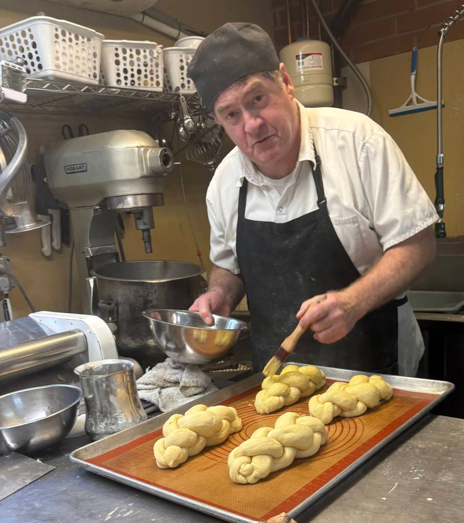 Shawn adding egg wash. Photos by Mindy Stern