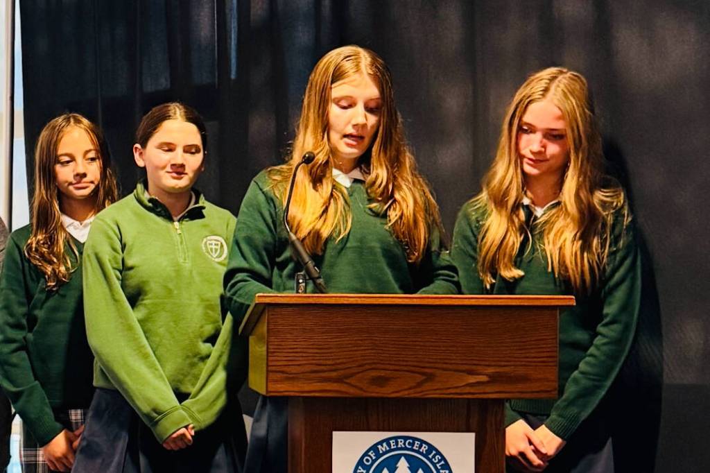 St. Monica Middle School students (left to right) Vivienne Street, Valerie Hay, Cara King and Hunter Lippens at the Mercer Island City Council meeting. Courtesy photo