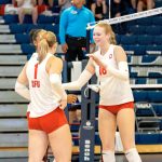 Mercer Islands Logan Remington, right, celebrates with her Simon Fraser University volleyball teammates during her record-setting game versus San Francisco State on Sept. 5 at Western Washington University. Photo courtesy of Jeff Evans / Western Washington University