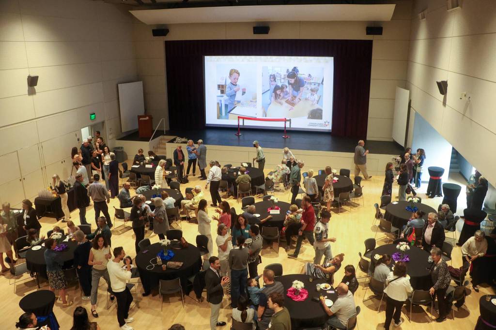 Attendees visiting at the Stroum Jewish Community Center of Greater Seattles early childhood school naming and reopening ceremony on Sept. 7. Photo courtesy of the SJCC