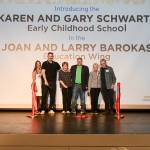 From left to right, Stroum Jewish Community Center of Greater Seattle CEO Amy Lavin, Charlie Barokas, Joan Barokas, Josh Barokas, Karen Schwartz and Gary Schwartz gather at the early childhood school naming and reopening ceremony on Sept. 7. Photo courtesy of the SJCC