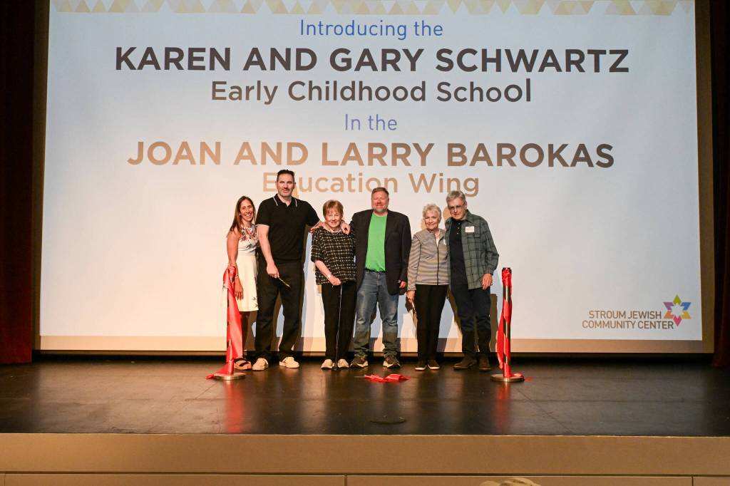 From left to right, Stroum Jewish Community Center of Greater Seattle CEO Amy Lavin, Charlie Barokas, Joan Barokas, Josh Barokas, Karen Schwartz and Gary Schwartz gather at the early childhood school naming and reopening ceremony on Sept. 7. Photo courtesy of the SJCC
