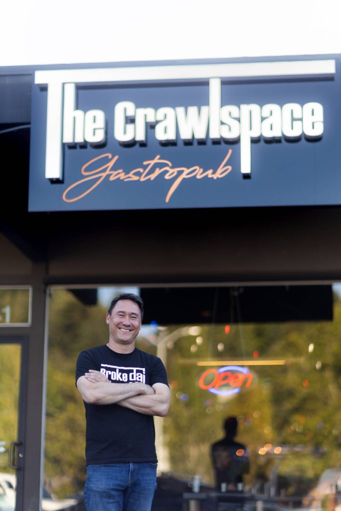 The Crawlspace Gastropub co-owner Jason Farrish stands in front of the Mercer Island restaurant. Courtesy photo