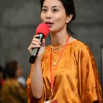 Fan Yuan, president of the Mercer Island Chinese Association, speaks at the event. This gathering reminds us that our common ground  our love for family, friends and community, and our shared sense of belonging  is far greater than any differences we might have. That is the true spirit of the Mid-Autumn Festival, she told the crowd, in part. Andy Nystrom/ staff photo