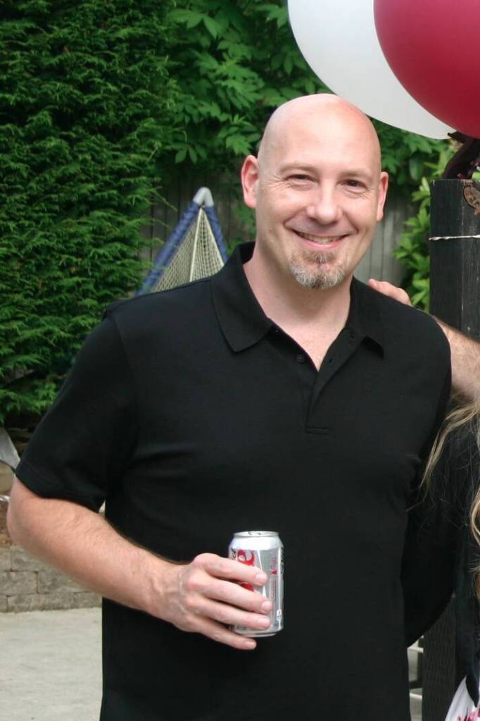 A photo of former Mercer Island High School English teacher Curtis Johnston at a students graduation party in 2011 while the two were in a secret, inappropriate relationship. (Photo provided by the students family)