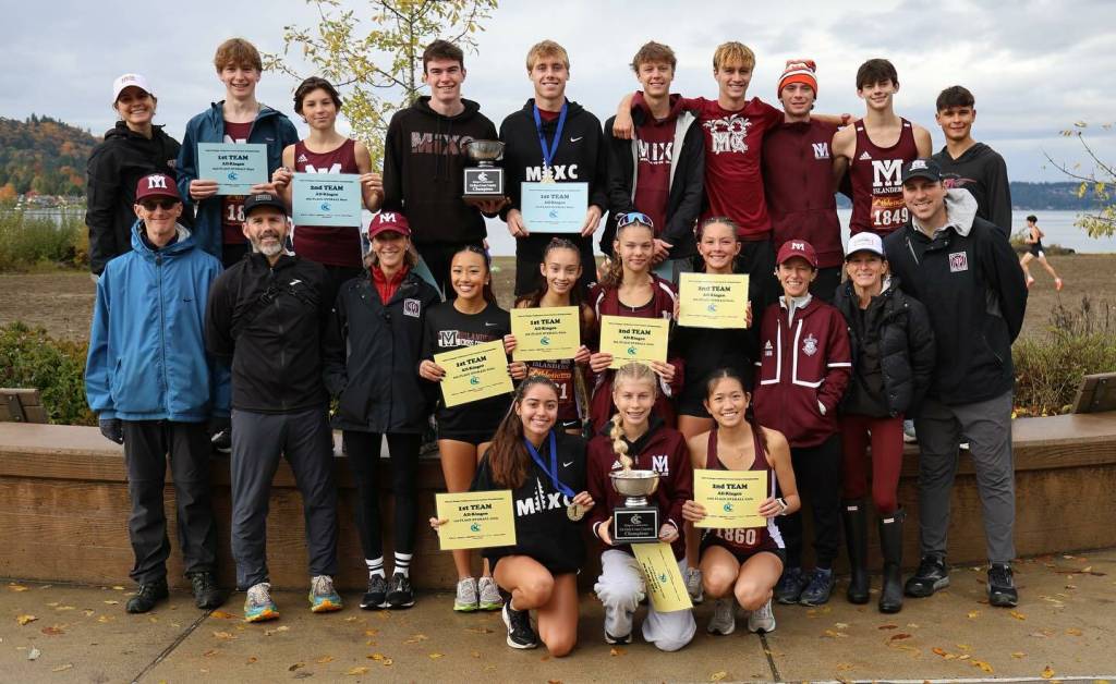 Mercer Island High Schools girls and boys cross country squads won the 3A KingCo team and individual titles on Oct. 25 at Lake Sammamish State Park. The boys repeated for the fifth year in a row and the girls made it a three-peat. Sophia Rodriquez (17:24.04) became a three-time consecutive champion and Matthew Lawrence (15:40.43) is the fifth Islander runner in a row to win the boys individual title. The 3A SeaKing district meet will take place on Oct. 31 at the same site. Photo courtesy of Scott Knoblich